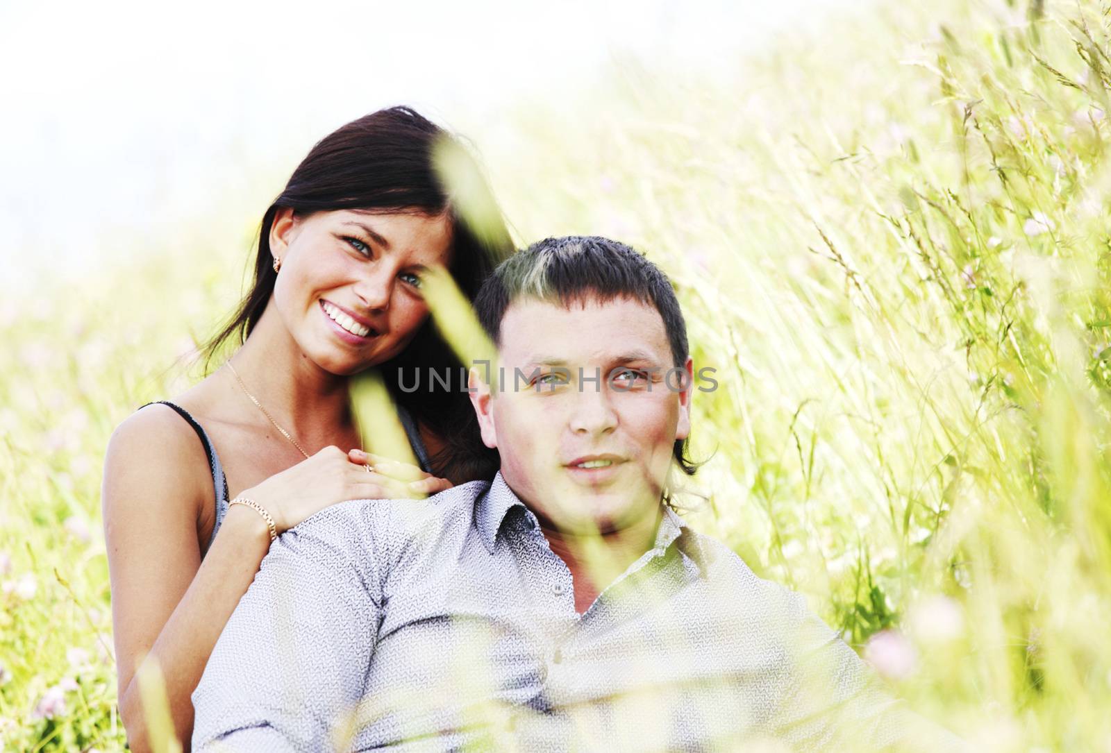 two lovers on grass field