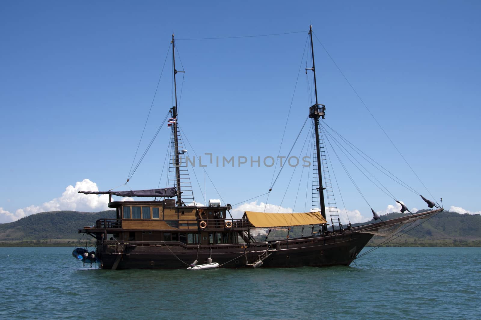 Tour boat anchored in Phang Nga Bay, Phuket, Thailand