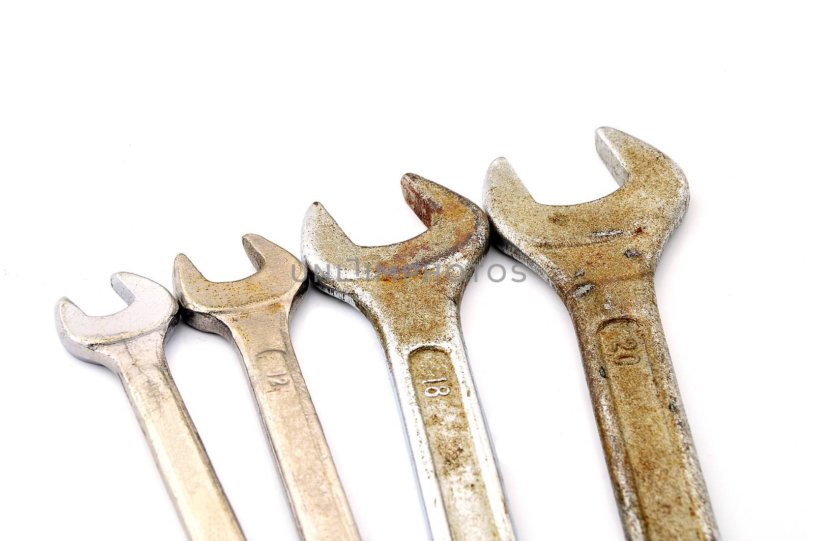  various sizes of old wrenches by Lekchangply