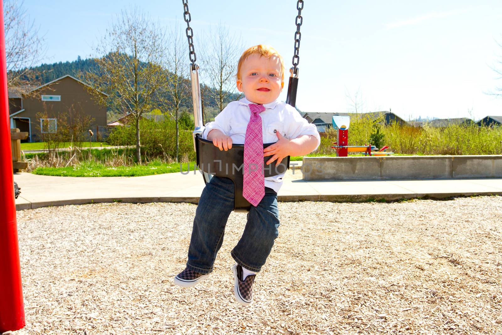 One Year Old Swinging by joshuaraineyphotography