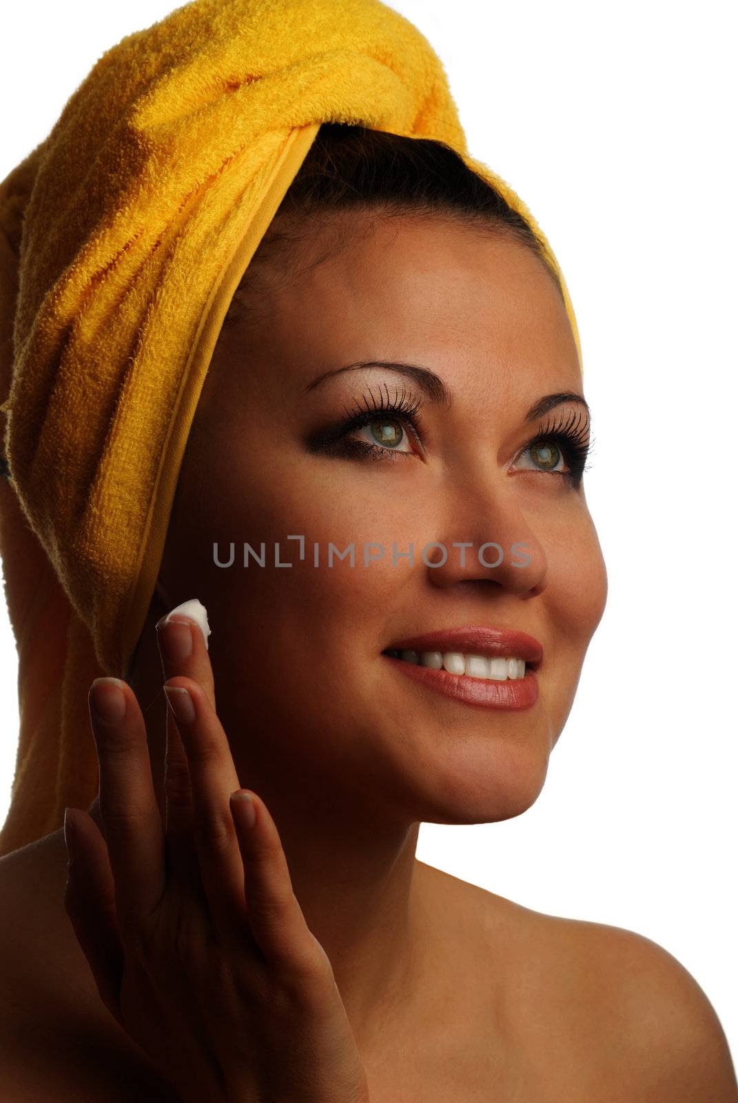 Photo of young pretty model with moisturing cream 