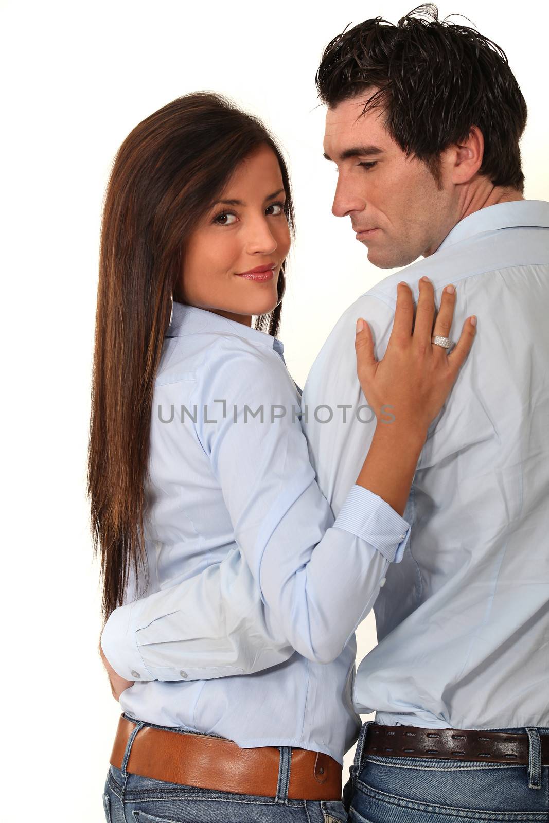 Couple with their arms around each other