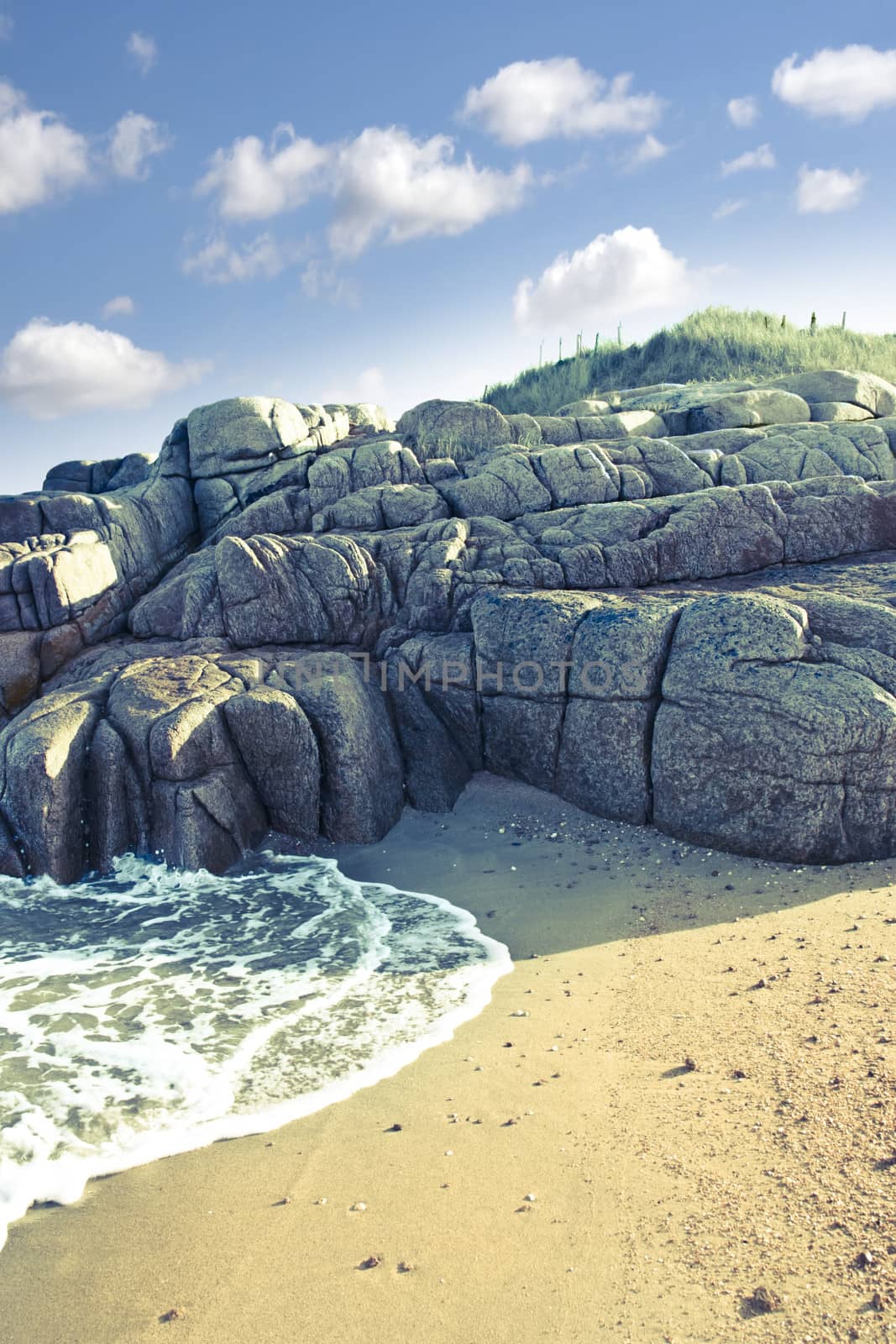 old natural rock formation on a coastal beach in county Donegal, Ireland