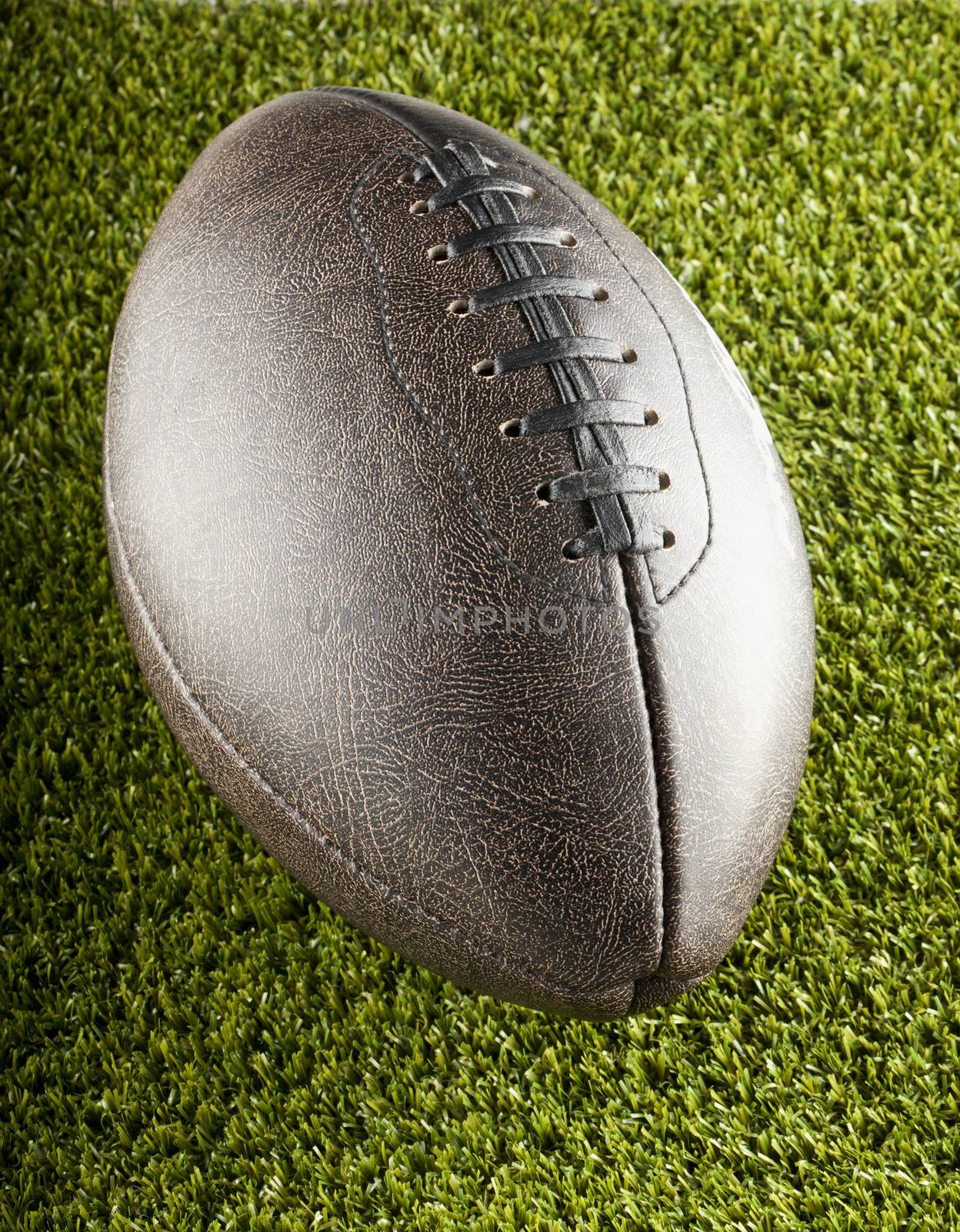 Close up of brown dark old football