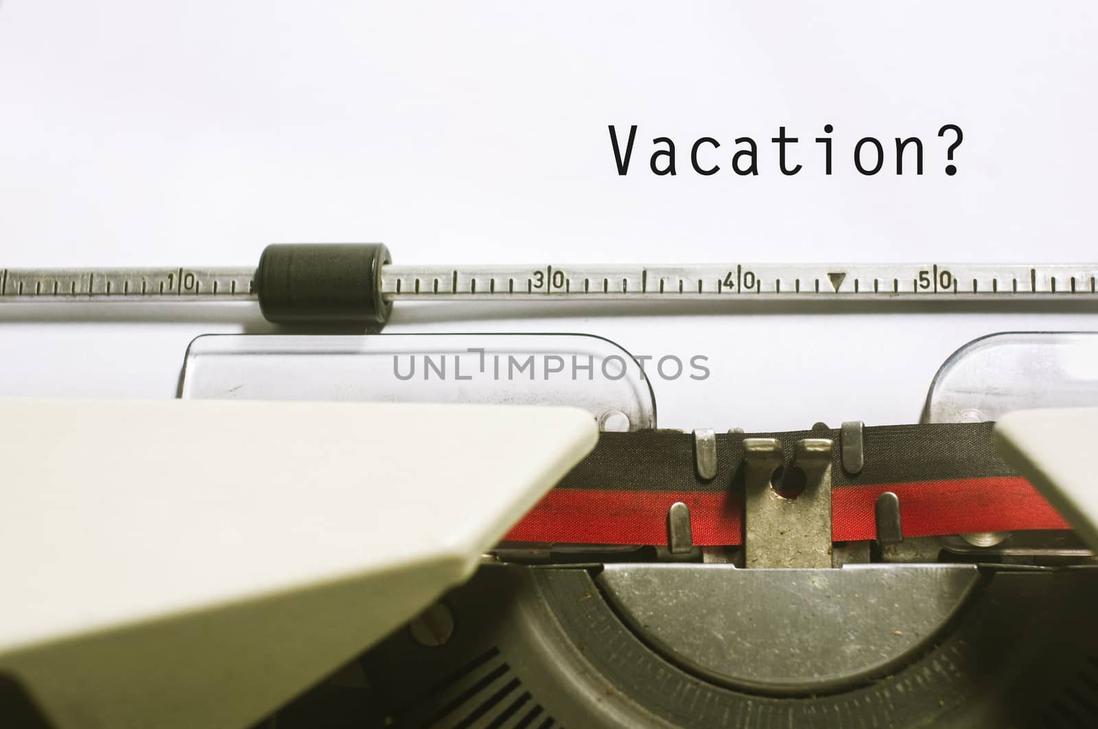 concepts of vacations from work, with message on typewriter.