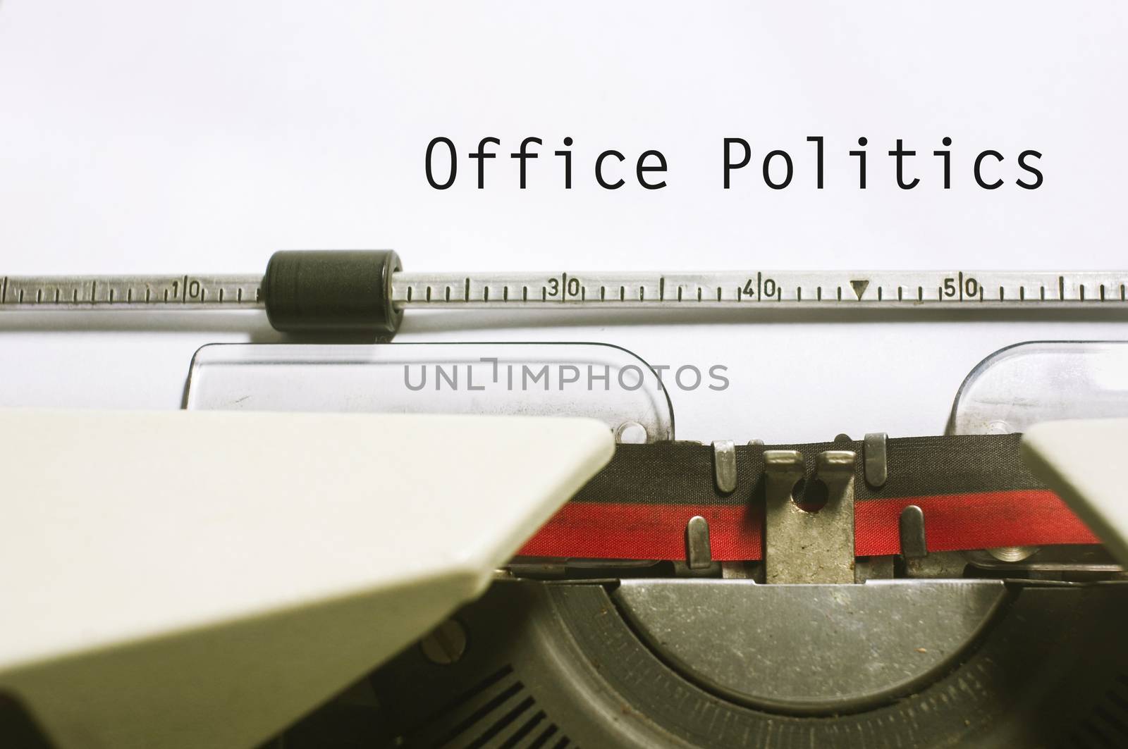 office politics, message on typewriter for conceptual background.