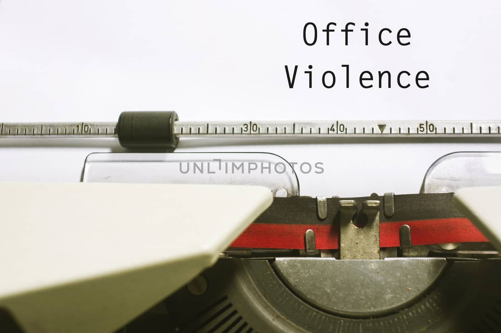 office or workplace violence, with message on typewriter paper.