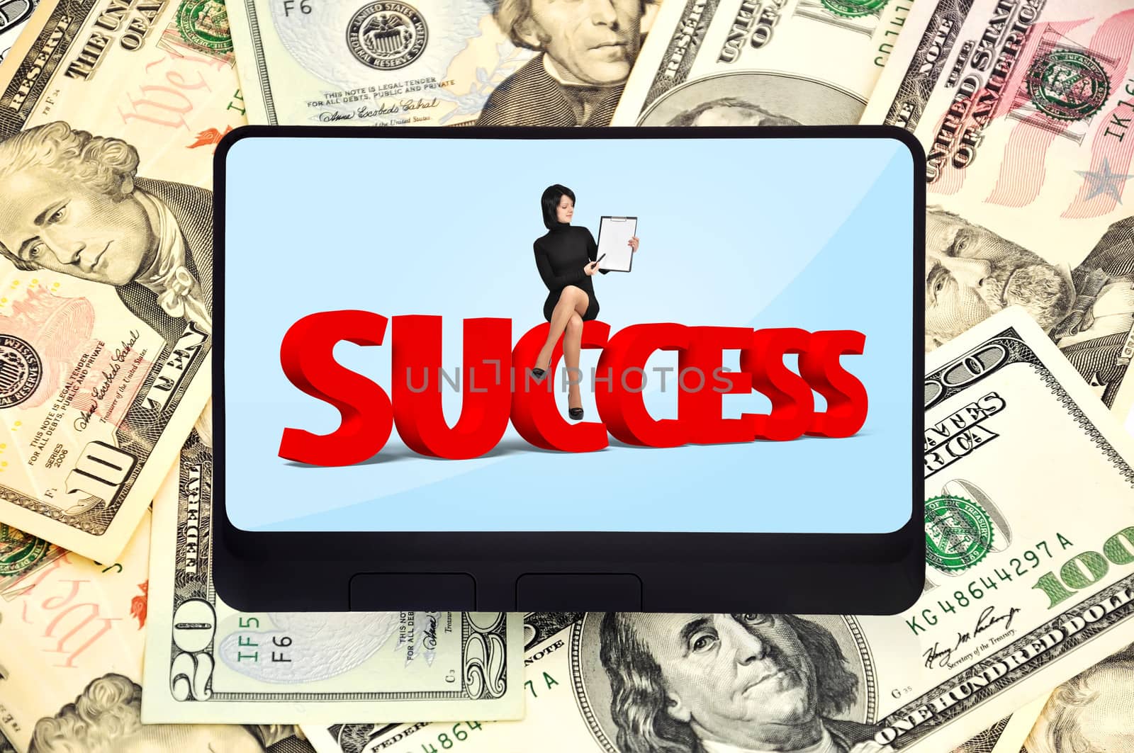 digital tablet with success symbol on background of dollars