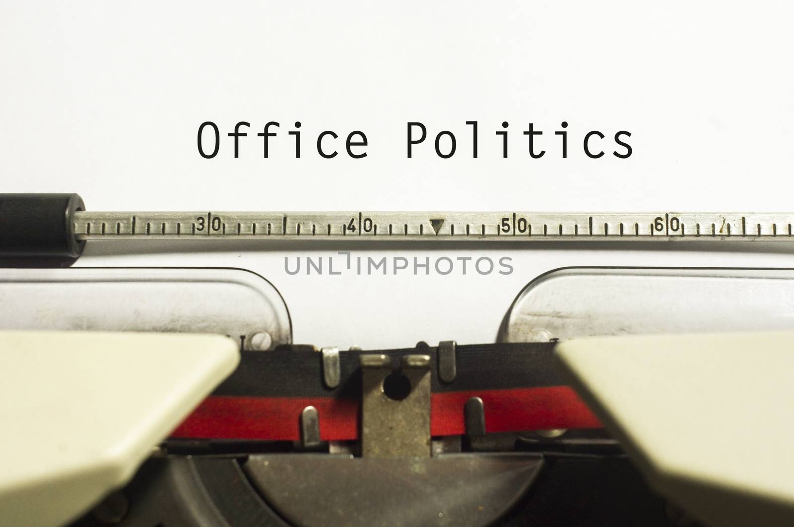 office politics, message on typewriter for conceptual background.