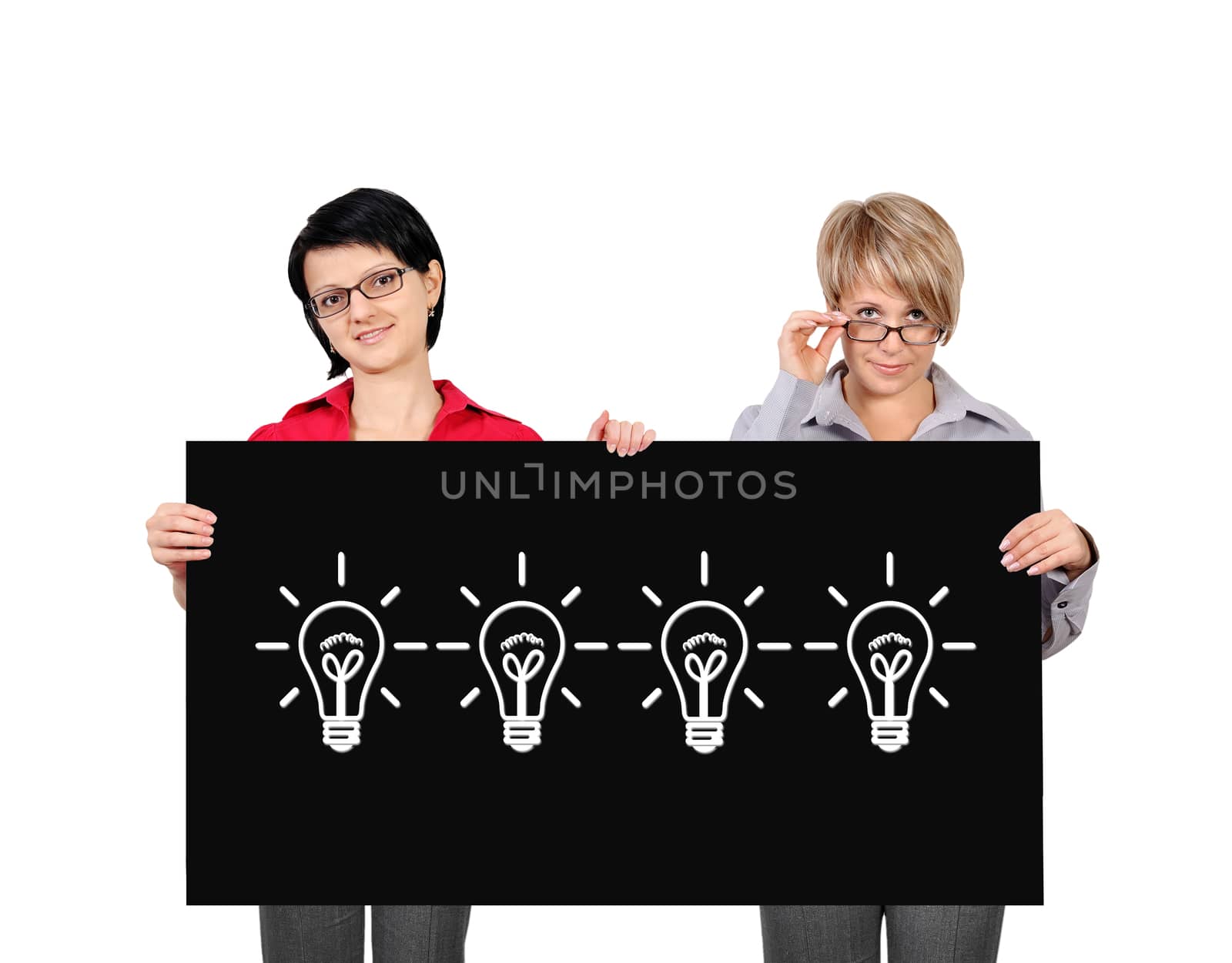 two woman holding billboard with lamps