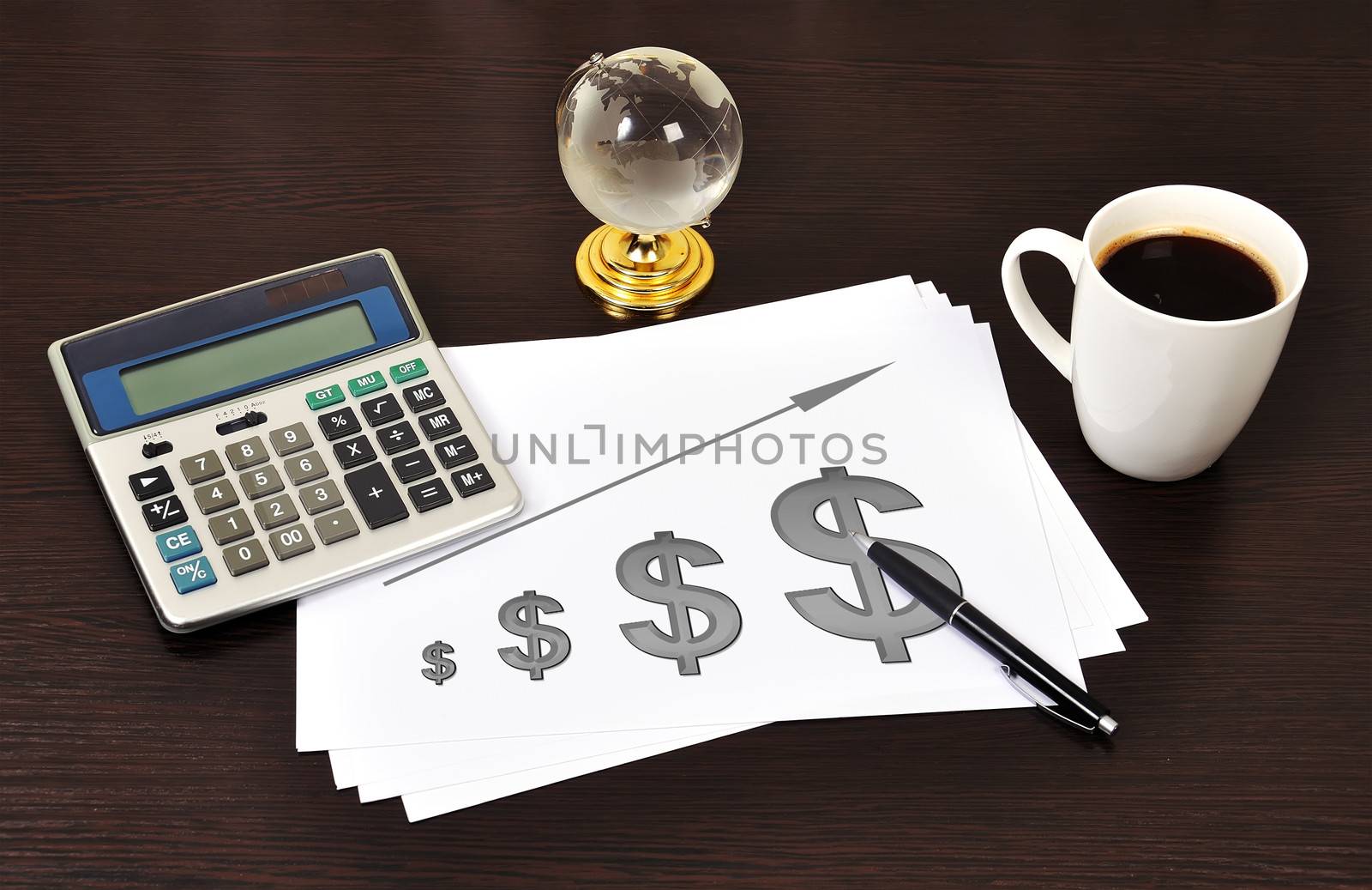workplace with chart of dollar on paper