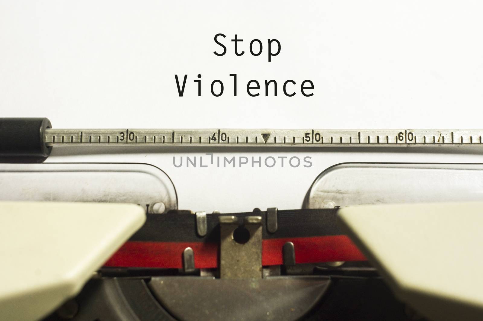 stop violence concept, with message on typewriter paper.