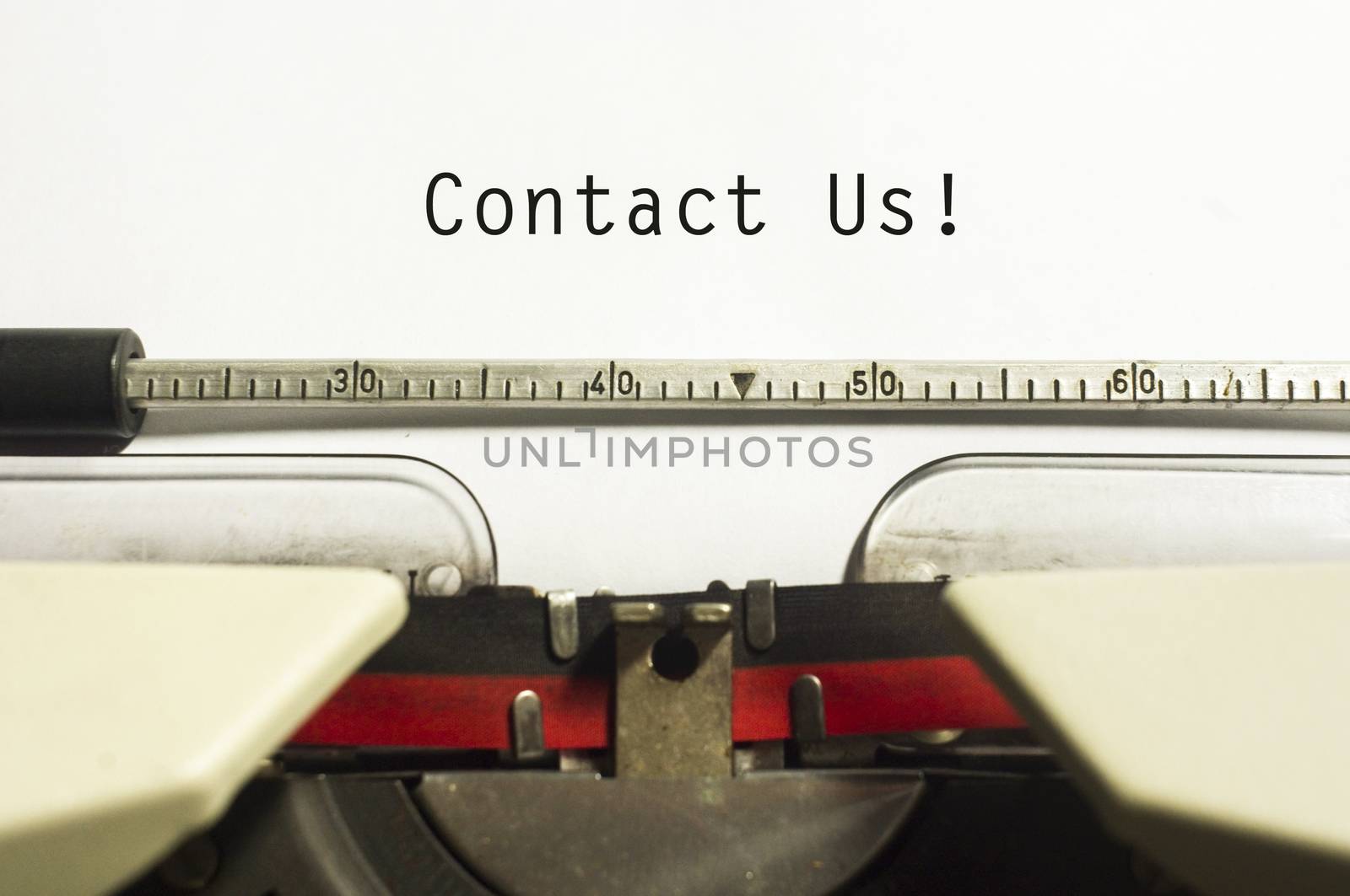 contact us concepts, with message on typewriter paper.