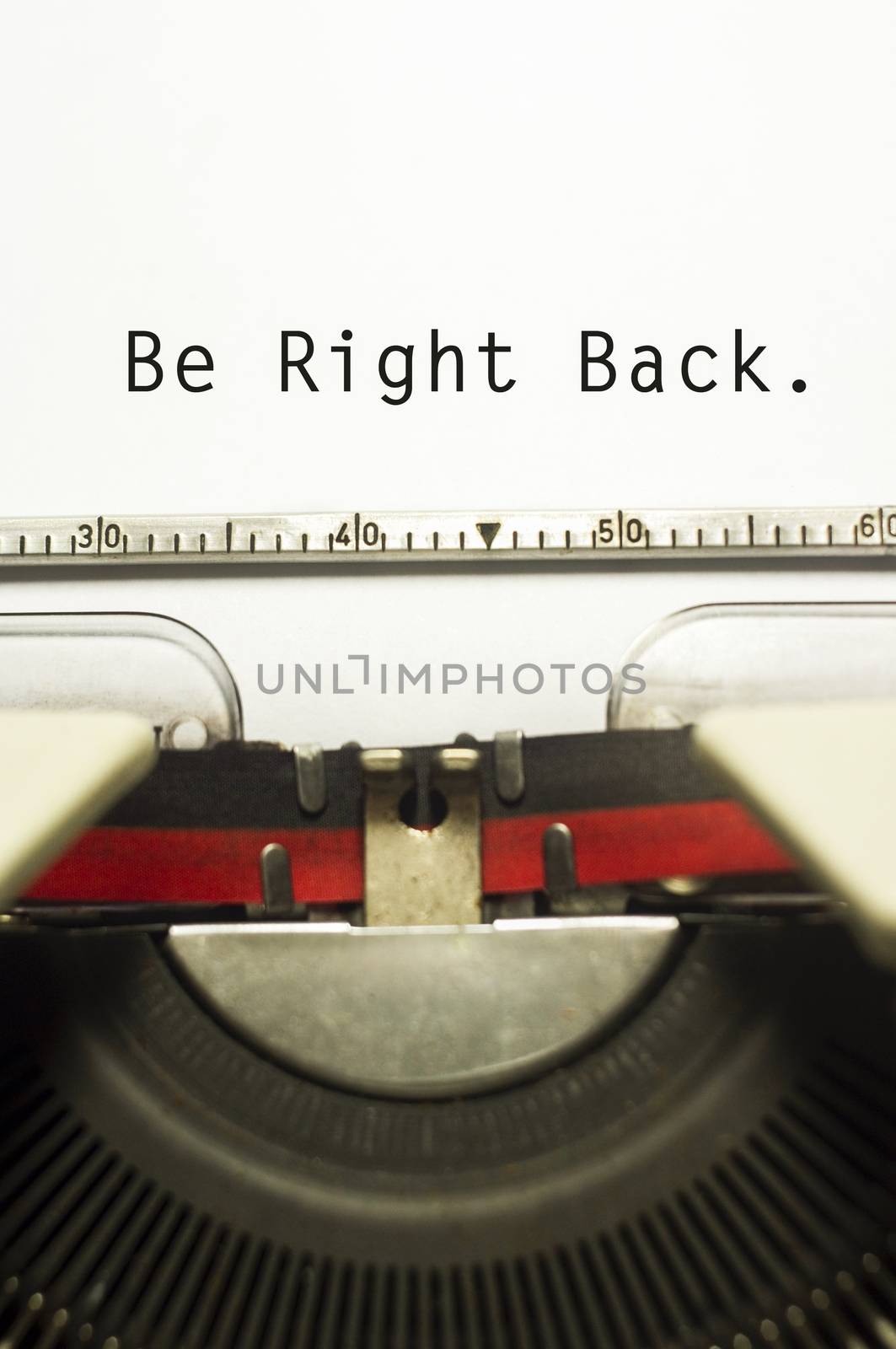 be right back concepts, with message on typewriter. For website maintenance message.
