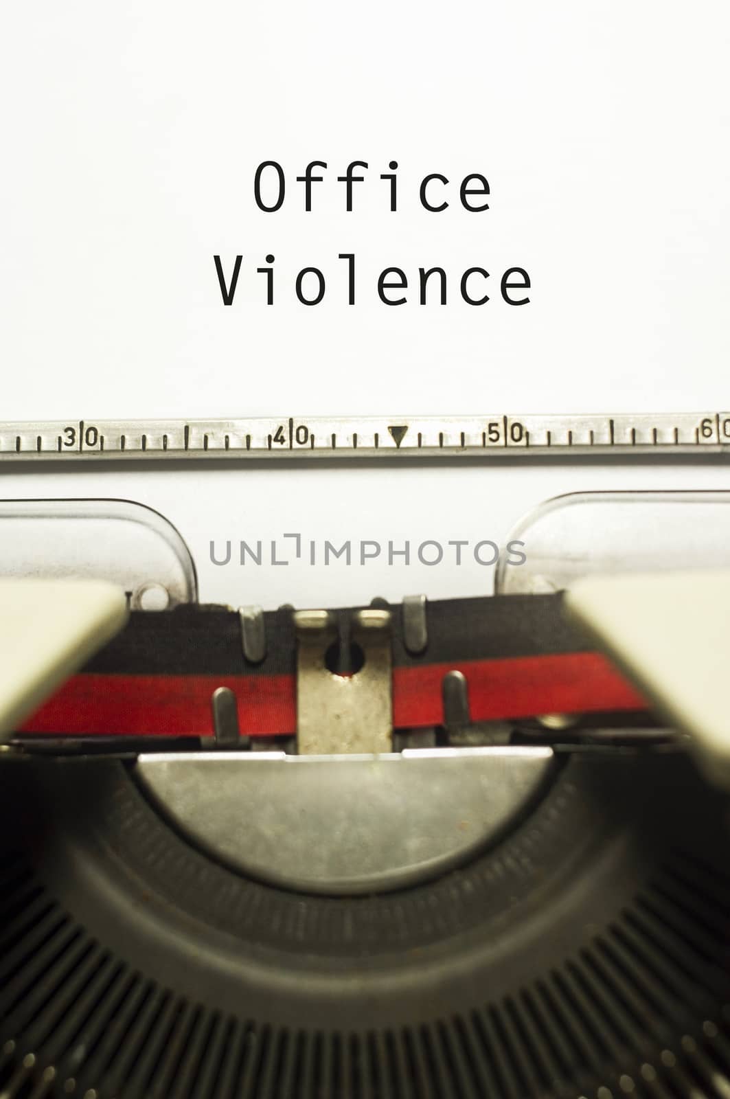 office or workplace violence, with message on typewriter paper.