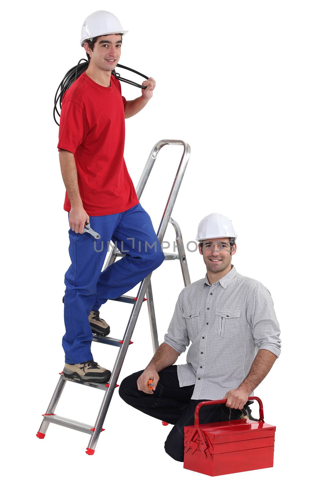 Electrician training young worker by phovoir