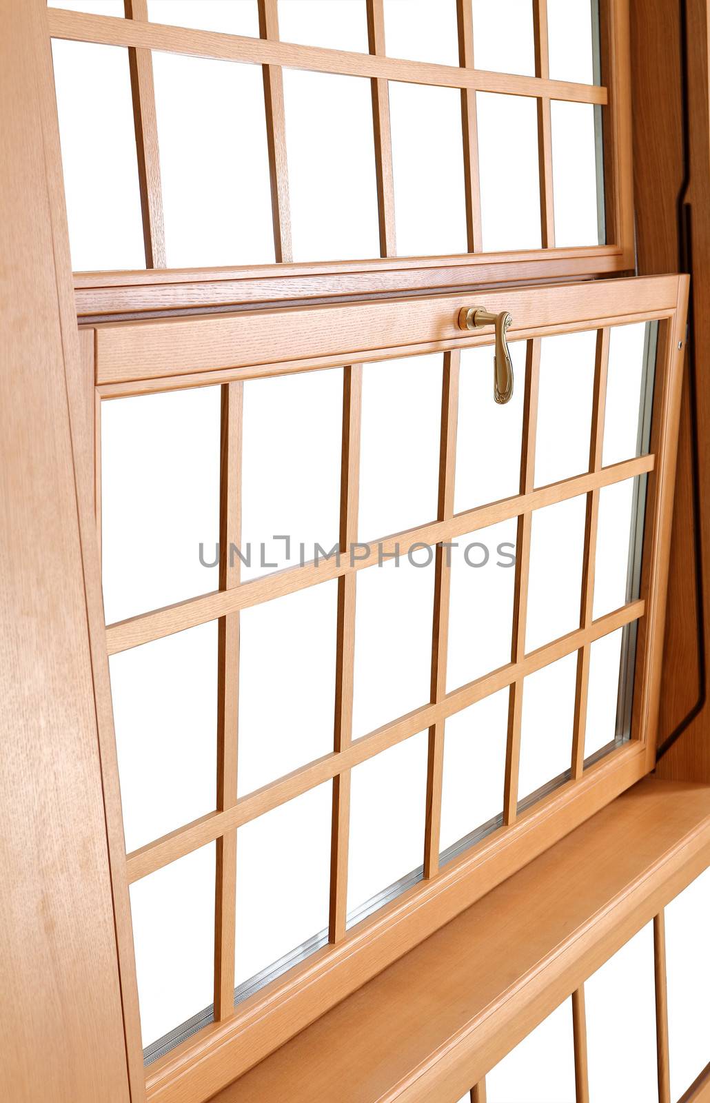 Wood Double Hung Windows. Double-hung window parts. The double hung is composed of two sashes that slide up and down, and tilt in for easy cleaning.  The windows use a constant force balancing system to support the weight of each sash. 