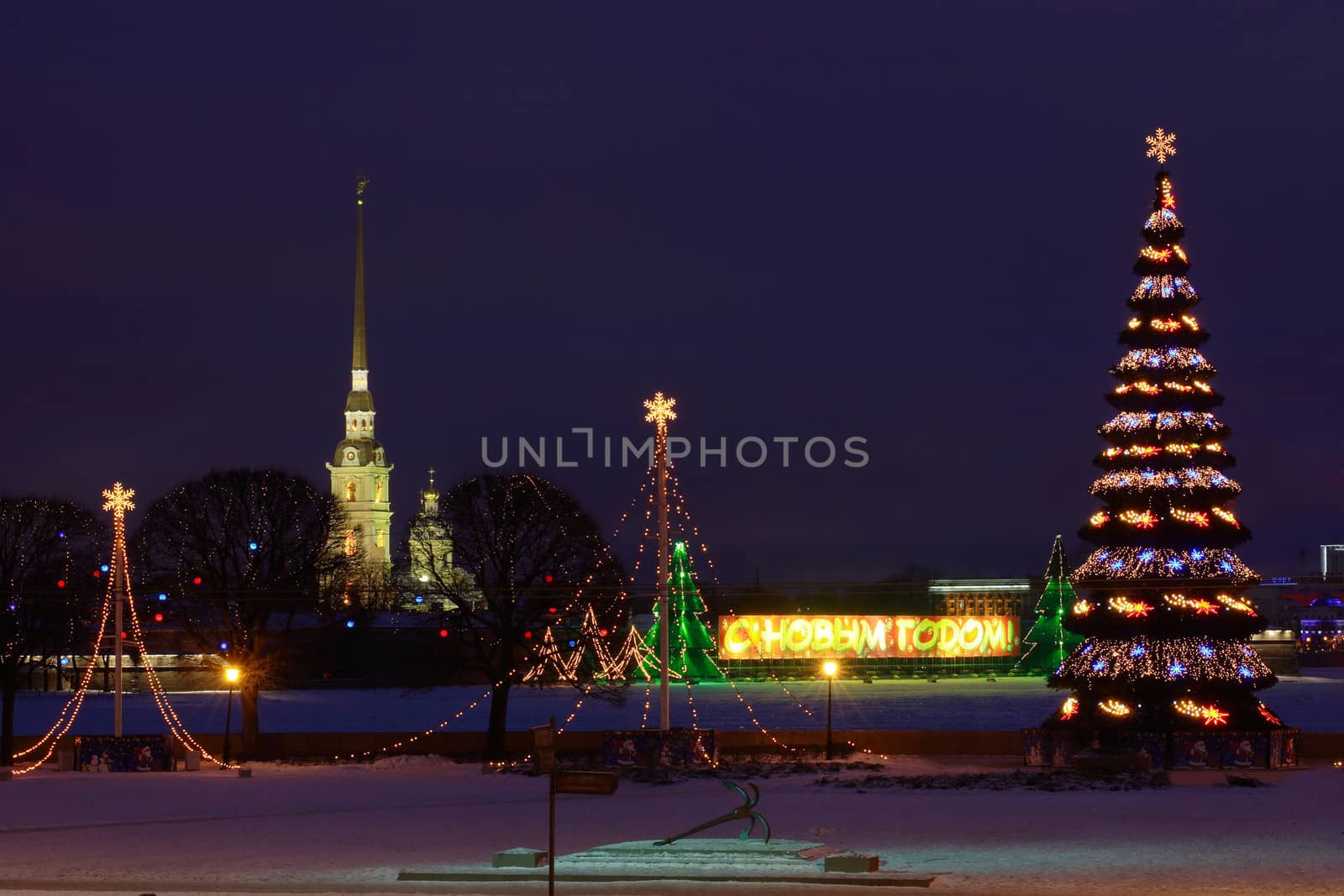 ST-PETERSBURG, RUSSIA - JANUARY 3: Christmas decorations of the Russian city, Russian Federation, Saint Petersburg, January 3, 2009.  Christmas tree on the spit of Vasilievsky Island. Urban photography in the evening light.   The Russian Federation, Saint Petersburg, New Year's Eve street design with night lighting.