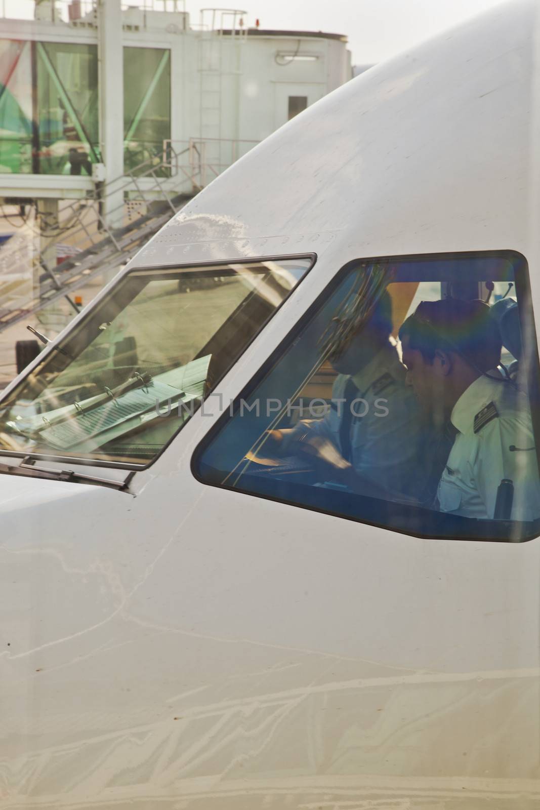 Captain and co-pilot make routine pre-flight checks on a commercial airline before take-off on an internal flight in Chennai, India