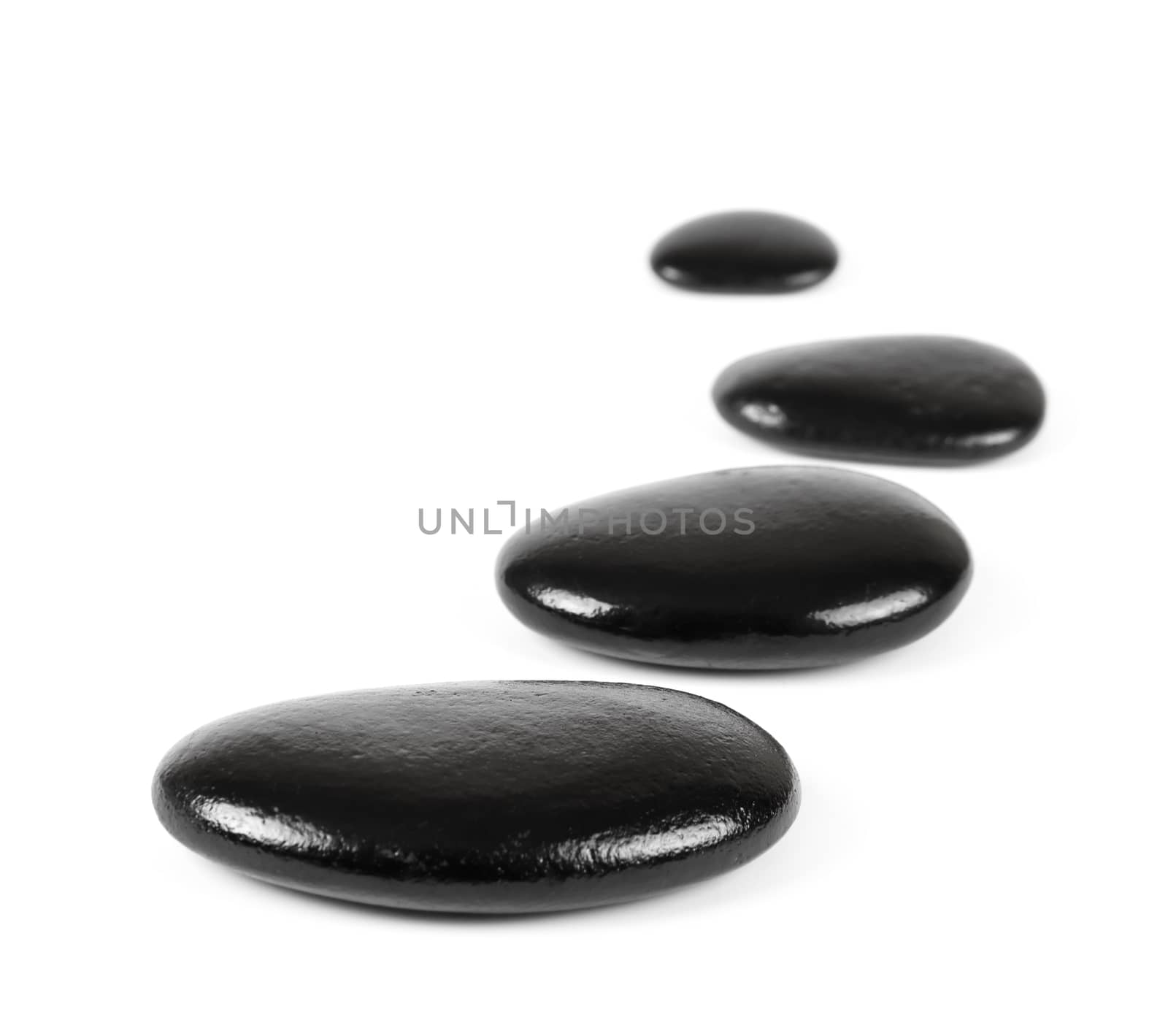 Black stones over white background by Bedolaga