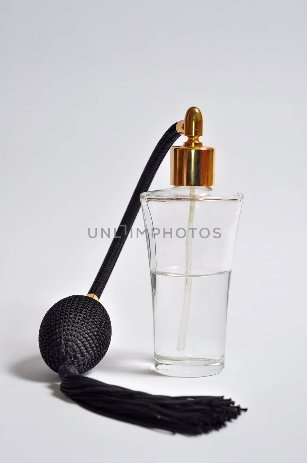 Bottle of perfume isolated on white