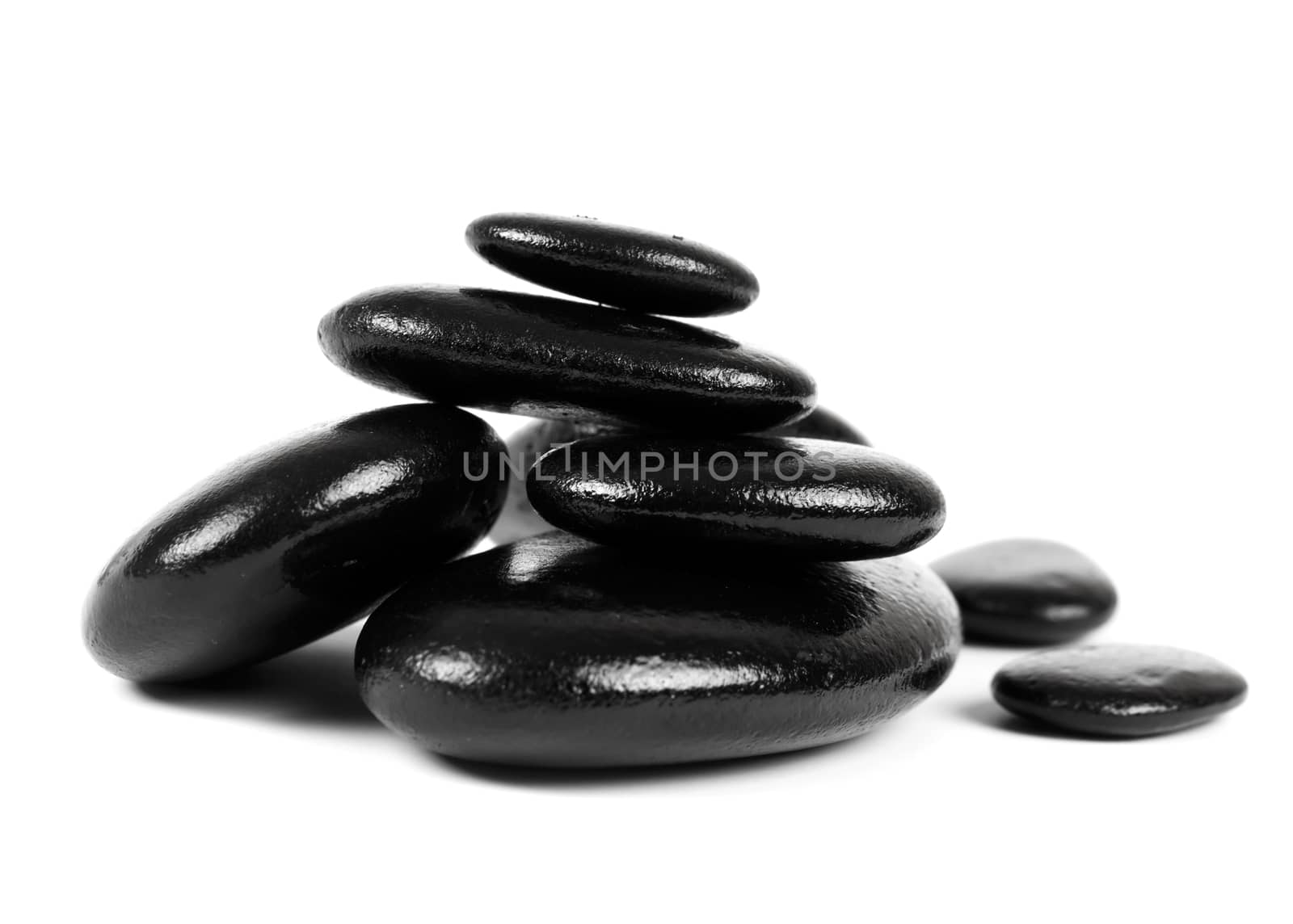 Black stones over white background