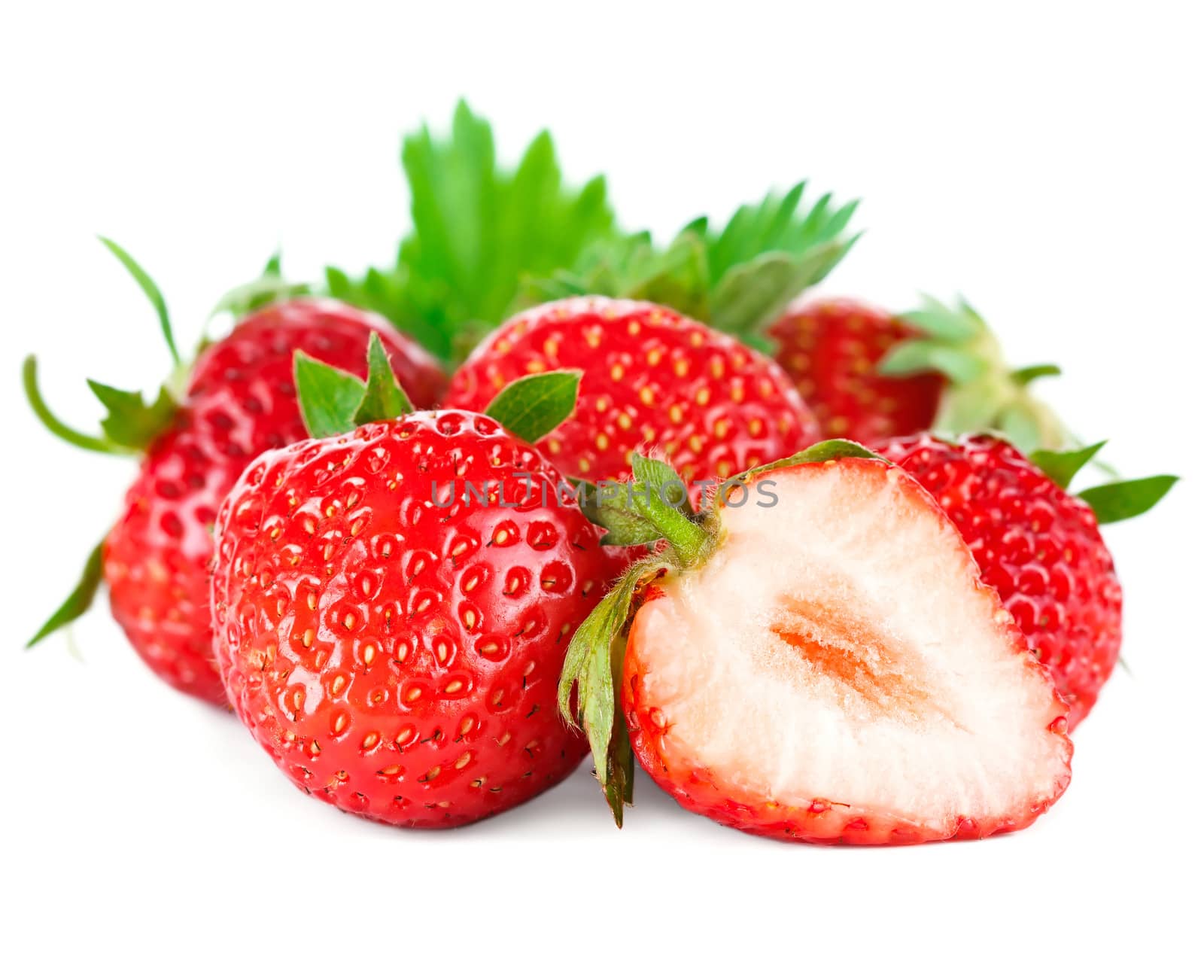 Beautiful ripe red fresh appetizing strawberries with leaves. Isolated on a white background.