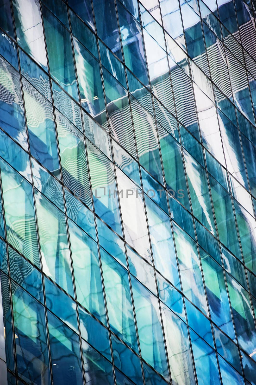 Windows of modern office building by kosmsos111