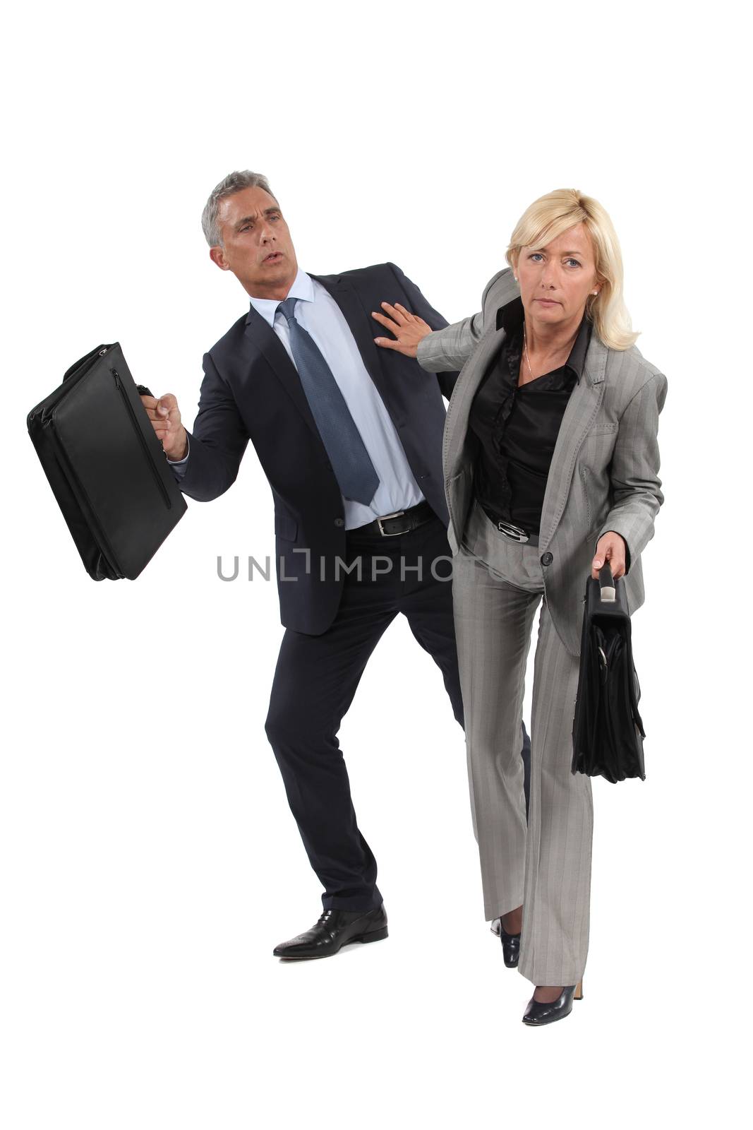 businesswoman pushing a colleague by phovoir