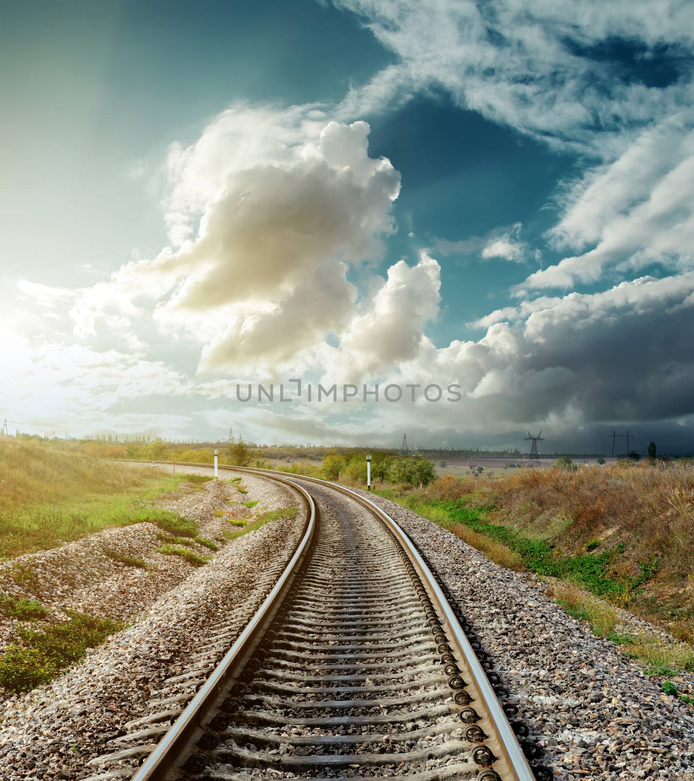 railway to horizon in sunset by mycola