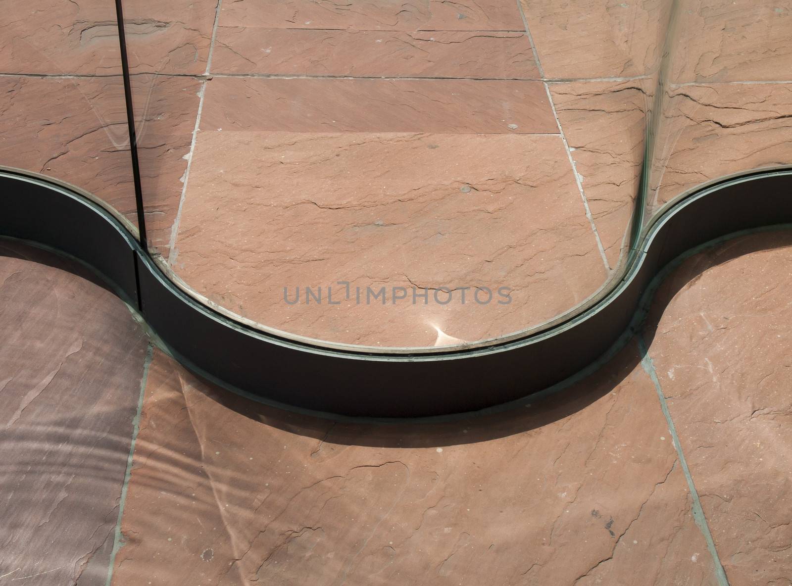 stone floor with glass wall as backgroundstone floor with glass wall as background