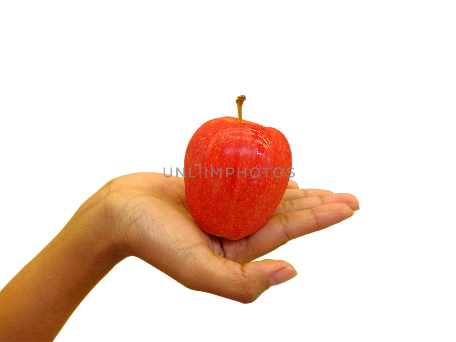 Woman holding red apple with a white background. Woman holding red apple with a white background.