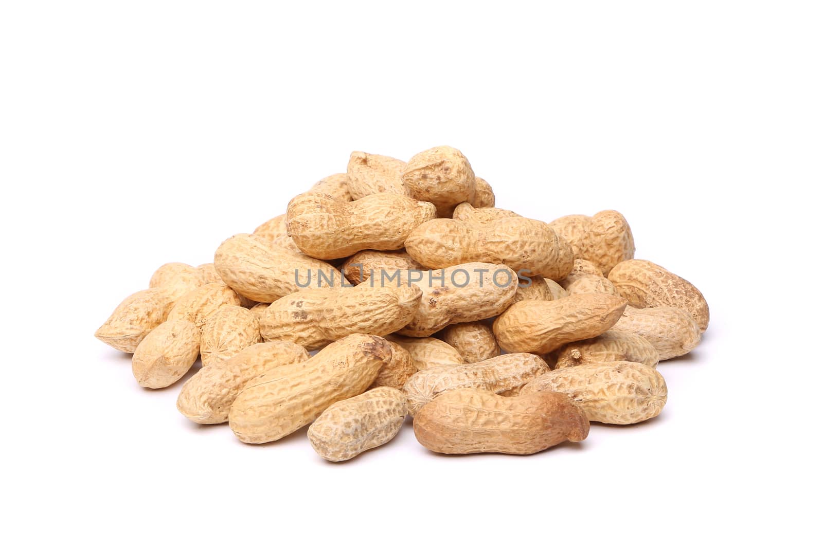 Dried peanuts in closeup by indigolotos