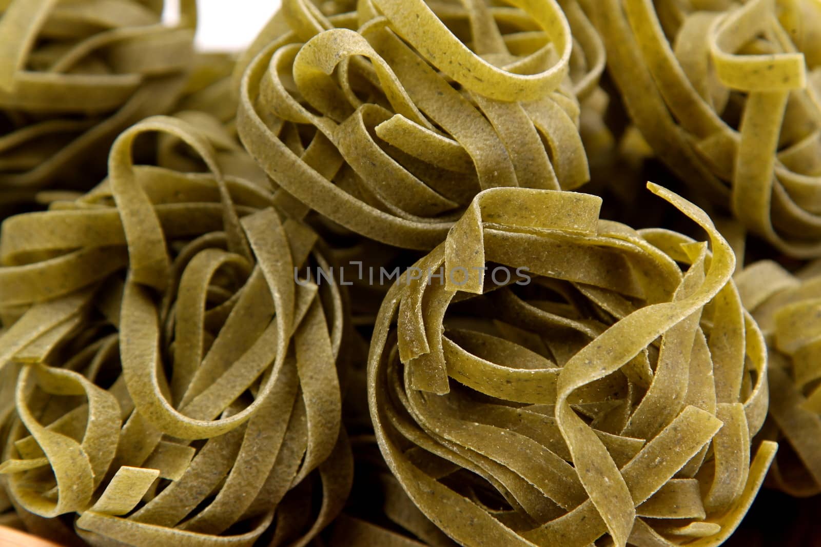 A background of tagliatelle paglia e fieno by indigolotos