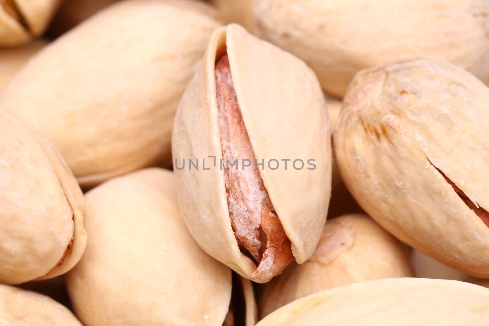 shelled pistachio close-up by indigolotos