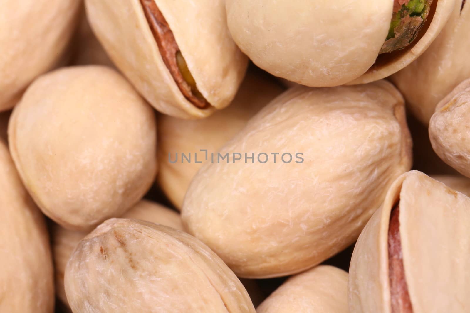 shelled pistachio close-up by indigolotos