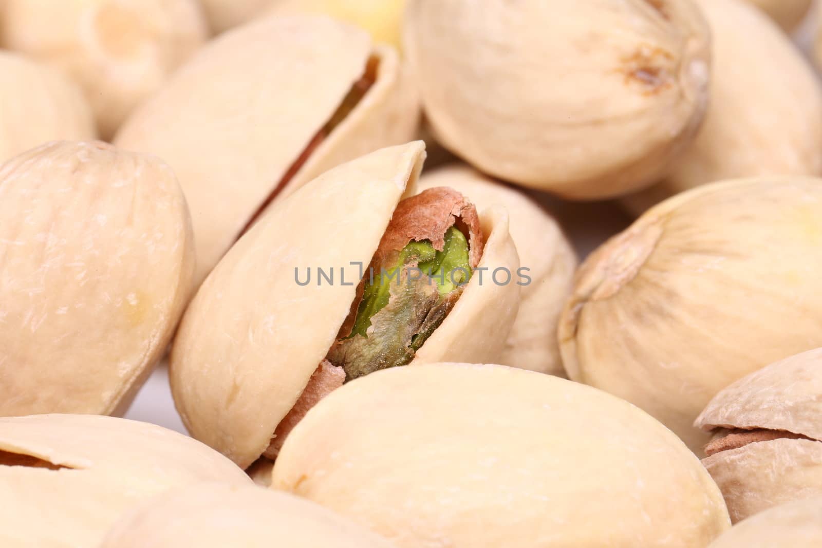 shelled pistachio close-up by indigolotos