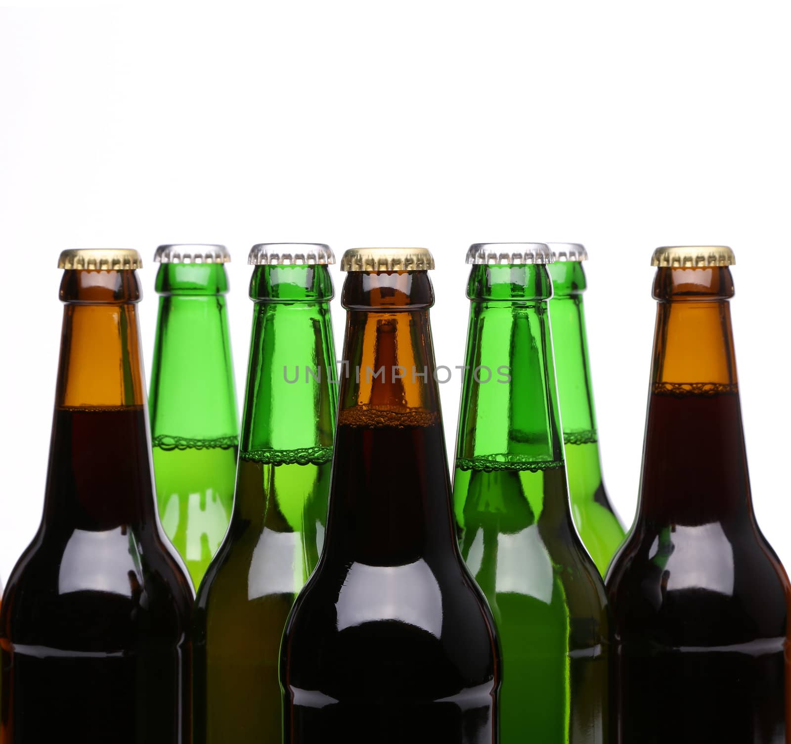 Closed bottles of beer isolated on a white background