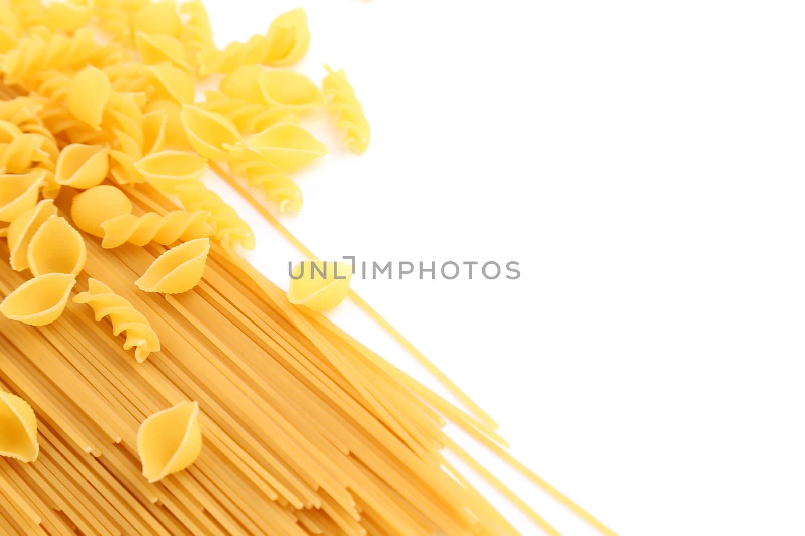 Frame of different pasta are located right on the white background