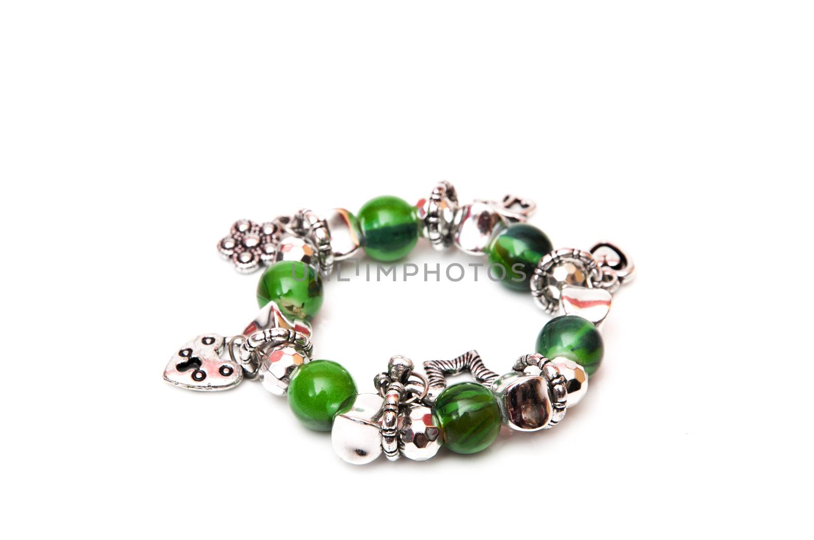 bracelet green balls on a white background
