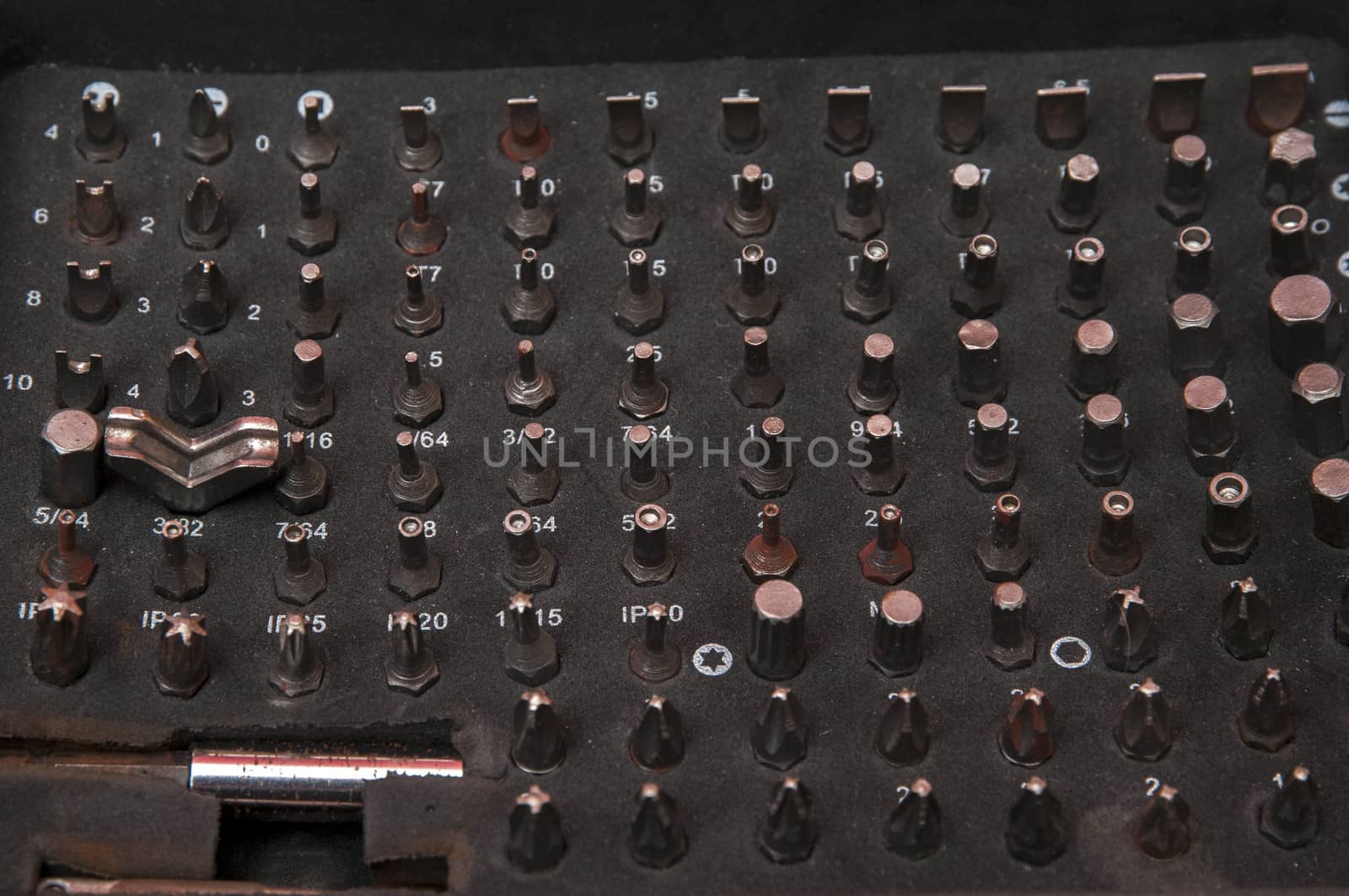 Several screws neatly stored in your briefcase
