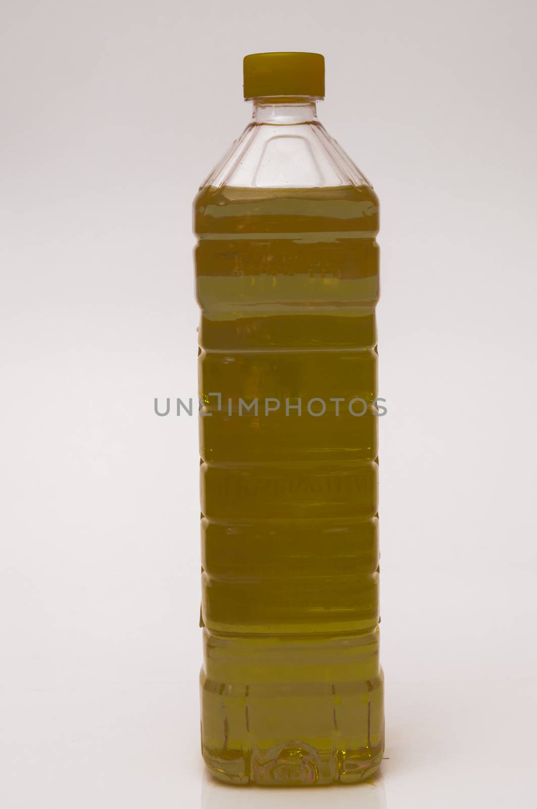 bottle of olive oil on a white background