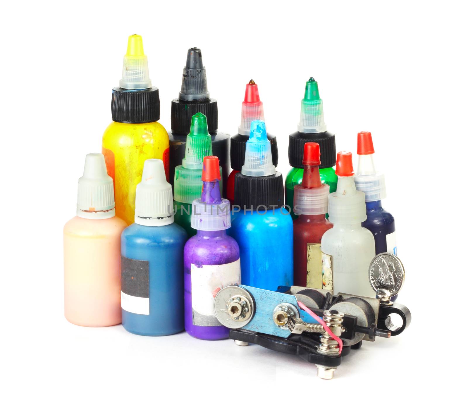 Tattoo machine with many color ink bottles isolated white background