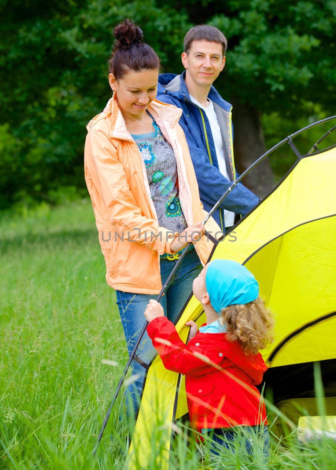 Family with doing camping in the park