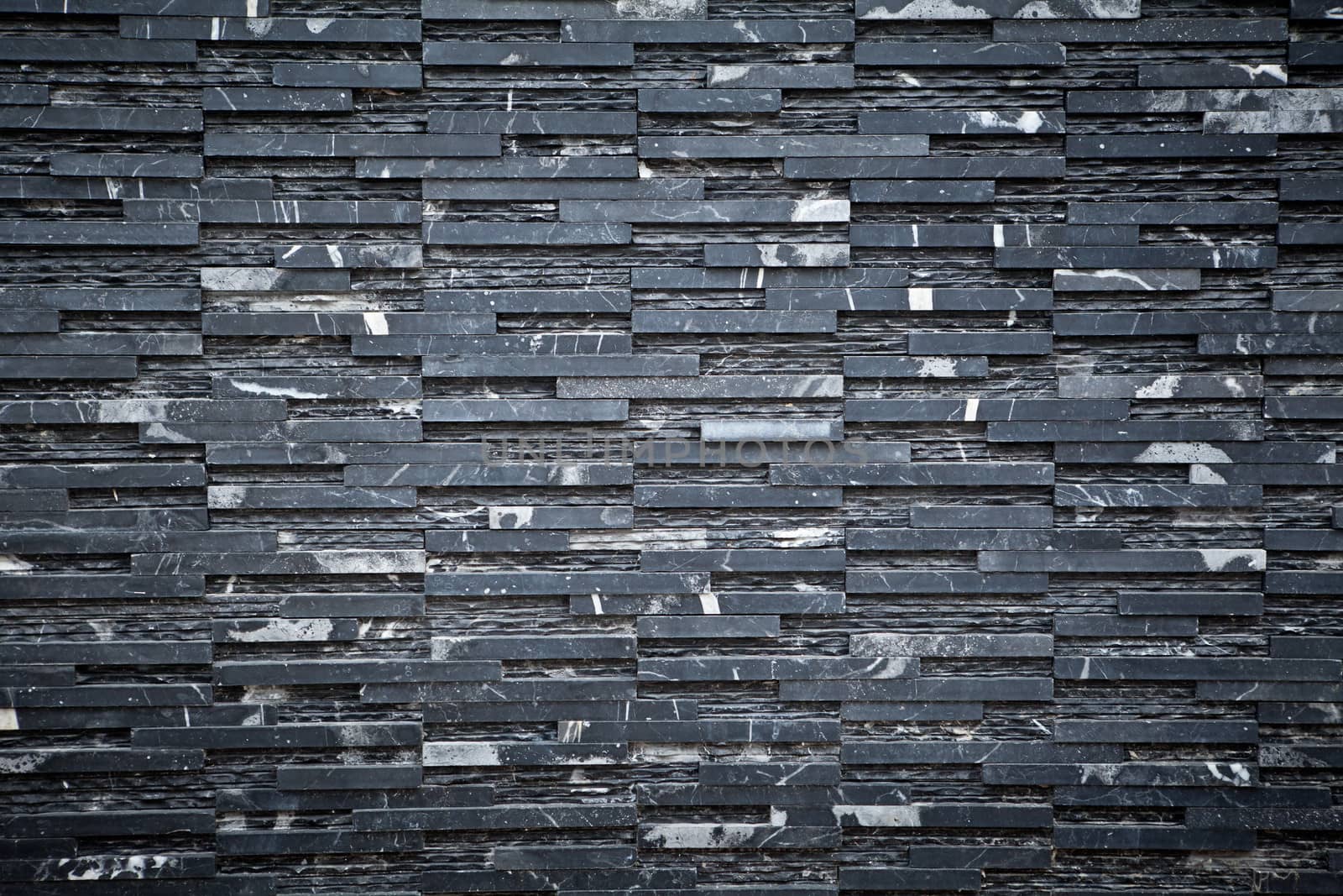 old black brick wall pattern as background