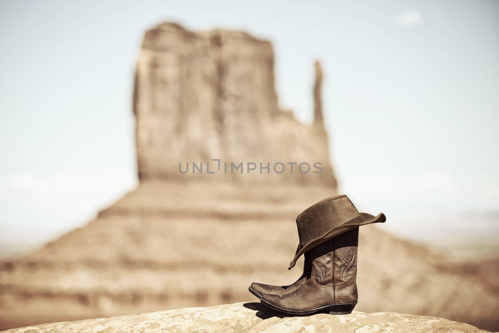 view of boots and hat in Monument Valley, USA