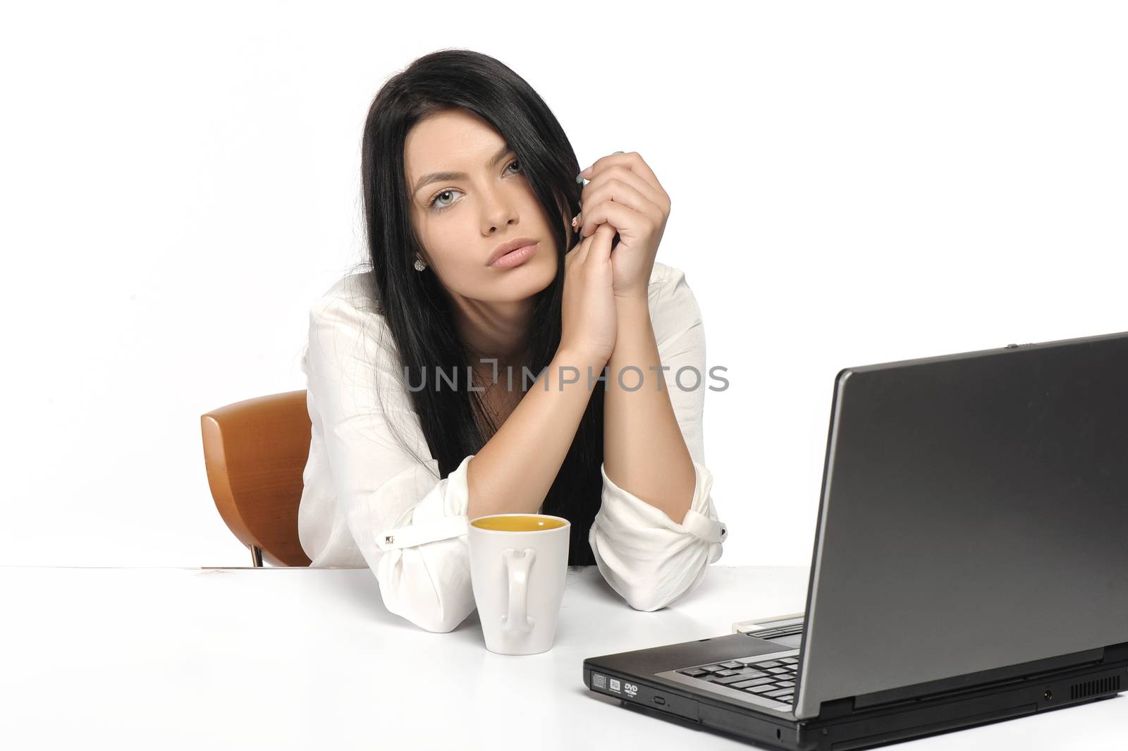 Bored business woman working on laptop looking very boring at the computer, Isolated white background