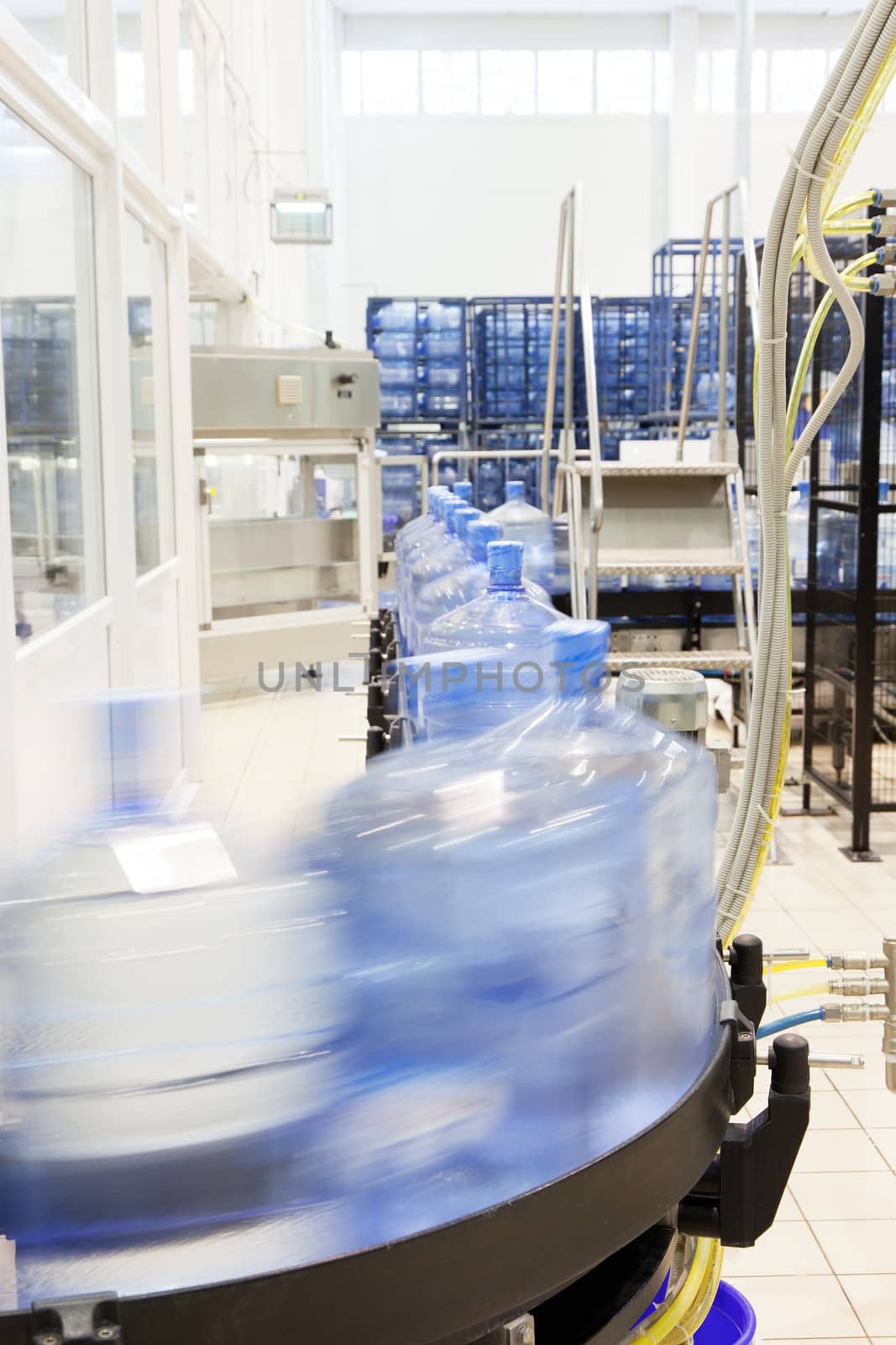 Modern industrial shop on pouring mineral water