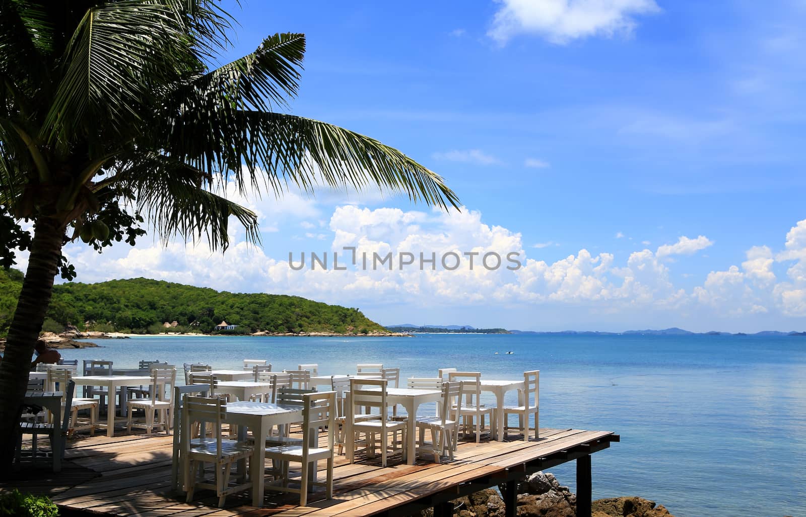 chairs on the white sand beach of Koh Samet in Rayong province, thailand