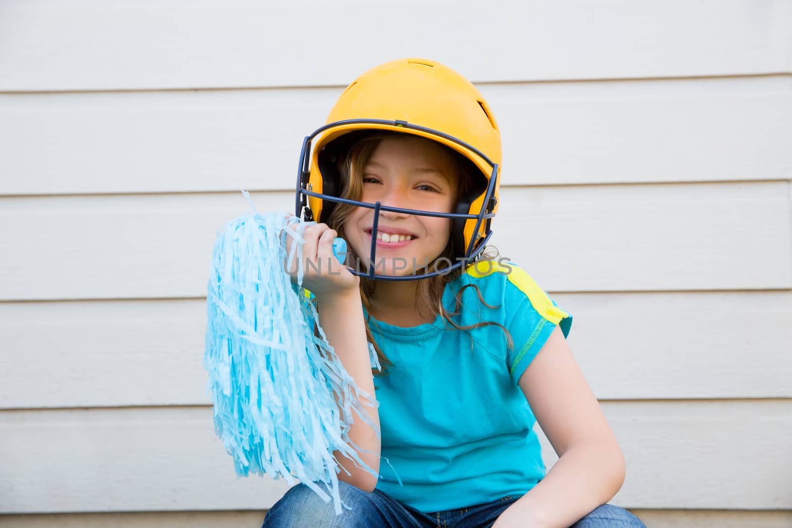 baseball cheerleading pom poms girl happy smiling with yellow helmet